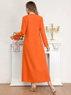 New Orange Long-Sleeve Kaftan Abaya, Featuring a Simple V-neck Design, a Smooth and Loose Fit, and Soft, The Long Length Conceals and Slims the Figure, Suitable for Both Daily Outings and Gatherings. This Vintage Exotic-style - Orange