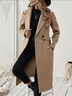 New Autumn/Winter Classic Notched Lapel Long Coat for Women, Waist-Cinching with Tie Belt and Two-Button Design, Over-the-Knee Outerwear, Elegant Commuter Style, Draped and Structured Long-Sleeve Coat with Side Pockets, Simple and Versatile, Slim Fit - Yellowish-brown