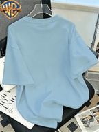 Official WB. Men's Short-sleeve T-shirt with Fun Cartoon Print Featuring the DC Batman Logo Character. Round-neck Top Suitable for Men's Casual Summer Daily Commutes, Home Wear, and Office Outfits - Light Blue
