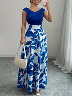 An Elegant V-Neck Floral Print A-Line Maxi Dress with Pockets - Featuring a Leaf Pattern, Short Sleeves, a Cinched Waist, And a Flowing Skirt, Perfect for Summer, Suitable for Both Casual And Formal Wear - Blue