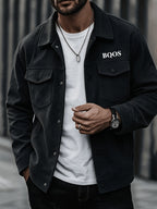 Men's American-style Corduroy Casual Jacket, Simple Casual Style, Lapel Collar, Single-Breasted with Multiple Pockets, Letter Embellishment, Comfortable Draping Fabric, Versatile Men's Apparel for Office Workers' Commuting and Outings in Spring - Black