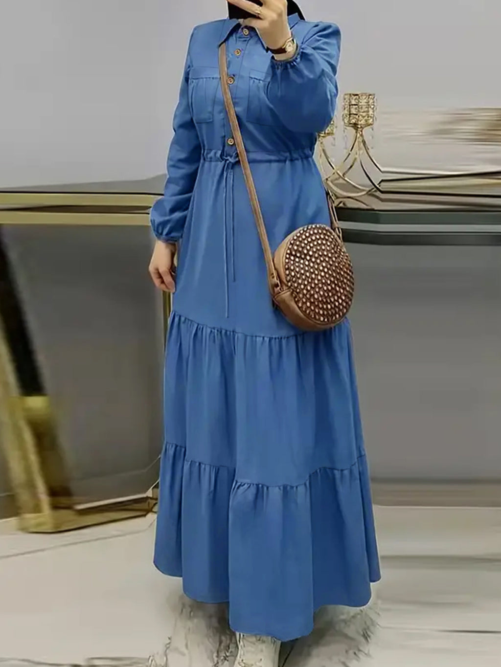 A Solid Color Long-Sleeve Dress for Women with a Fitted Waist, Tie Detail, And Ruffled Hem - Blue