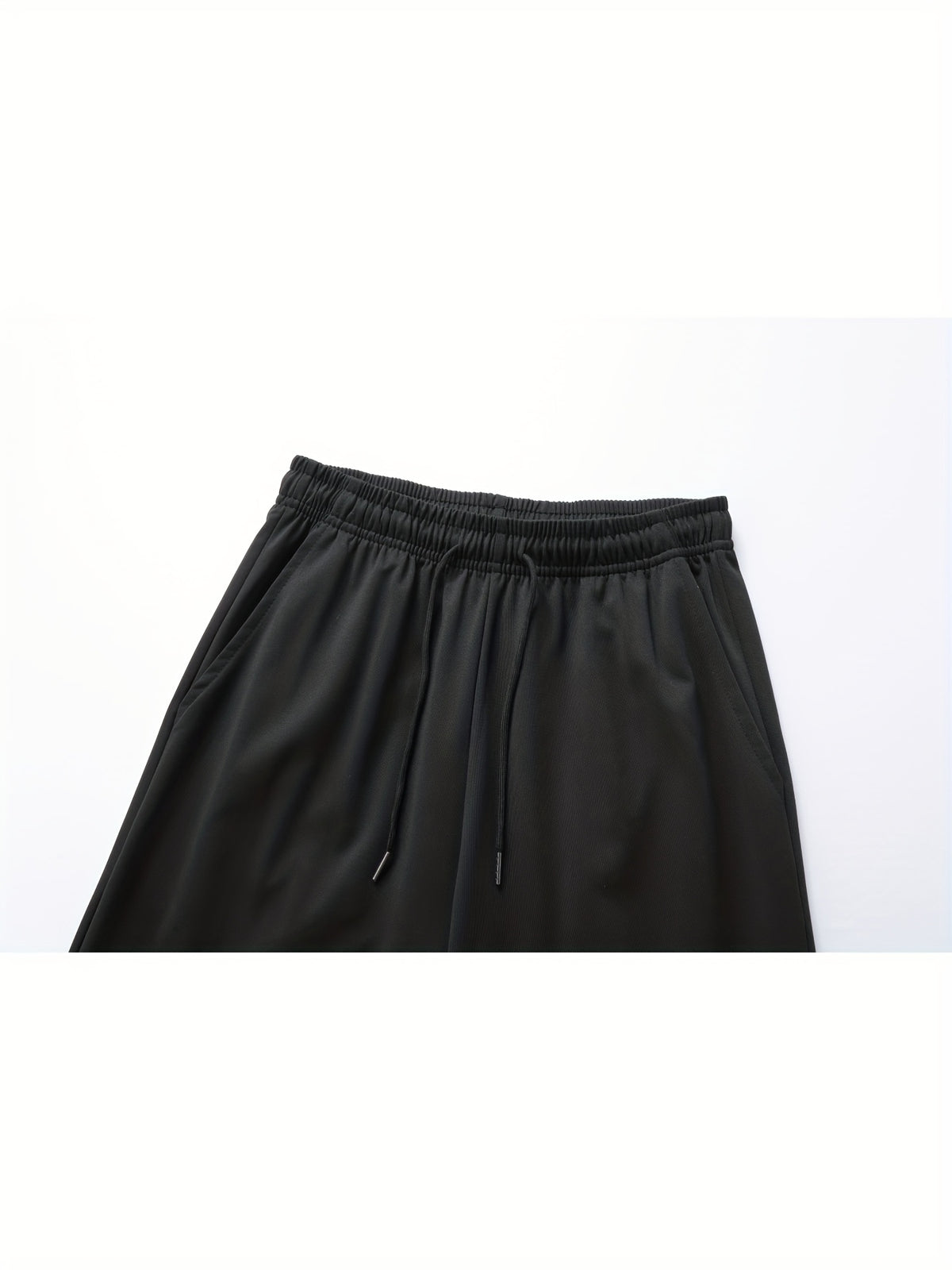 A Pair of Summer Women'S Long Pants, Casual Trousers for Women, Made of And, Featuring Elastic Fabric with Tapered Legs, an Elastic Drawstring at The Waist, Side Pockets, Suitable for Outdoor, Camping, Wear, And Women'S Pants. - Black
