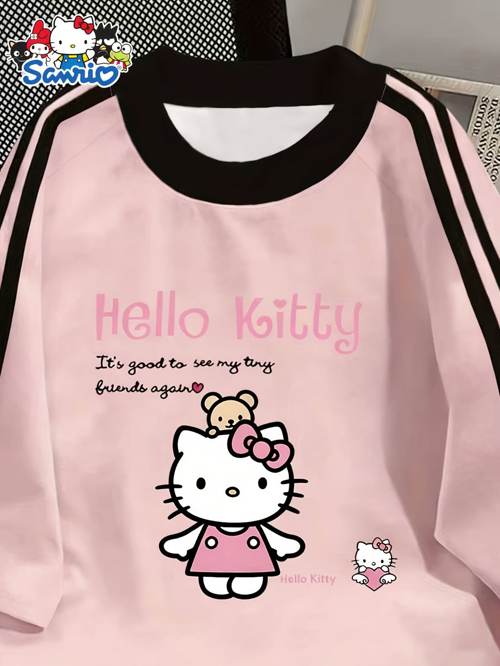 Sanrio Hello Kitty Cartoon Pattern Casual Fashion T-shirt from Sanrio, Black Contrasting Design, Round Neck Short Sleeved Shirt, Cute T-shirt, Perfect for Spring and Summer Casual Wear and Holiday Gifts - Pink