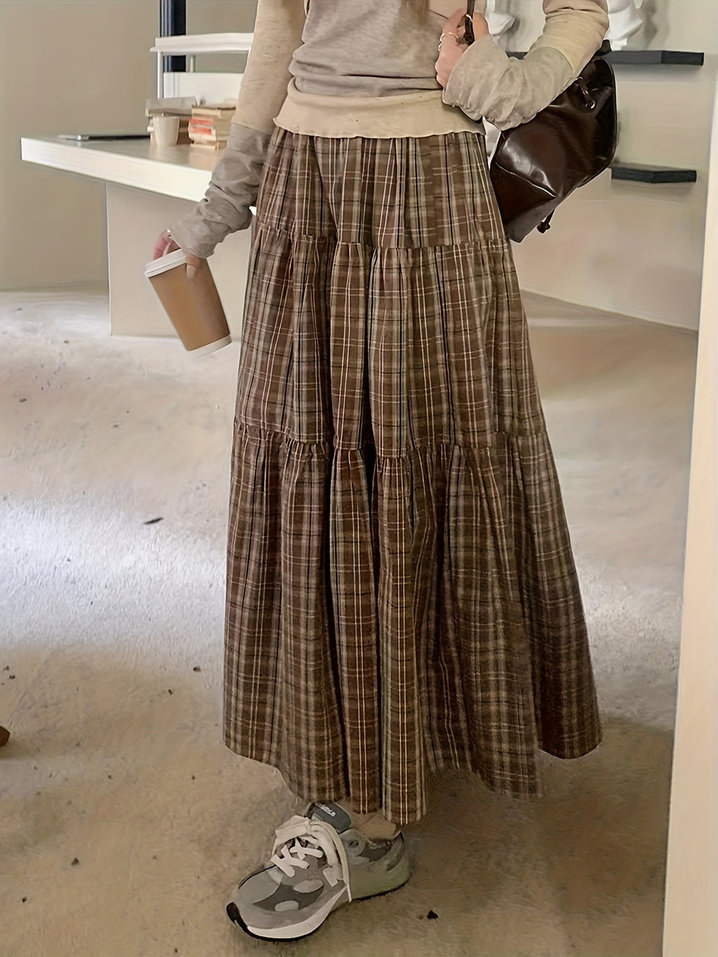 The Latest Plaid Cake Midi Skirt Is Very Beautiful And Suitable for Spring And Autumn. It Has a Retro, Large Skirt, Loose Fit, Covers The Hips, And Makes You Look Slimmer. It Also Has a Lining - Coffee Brown