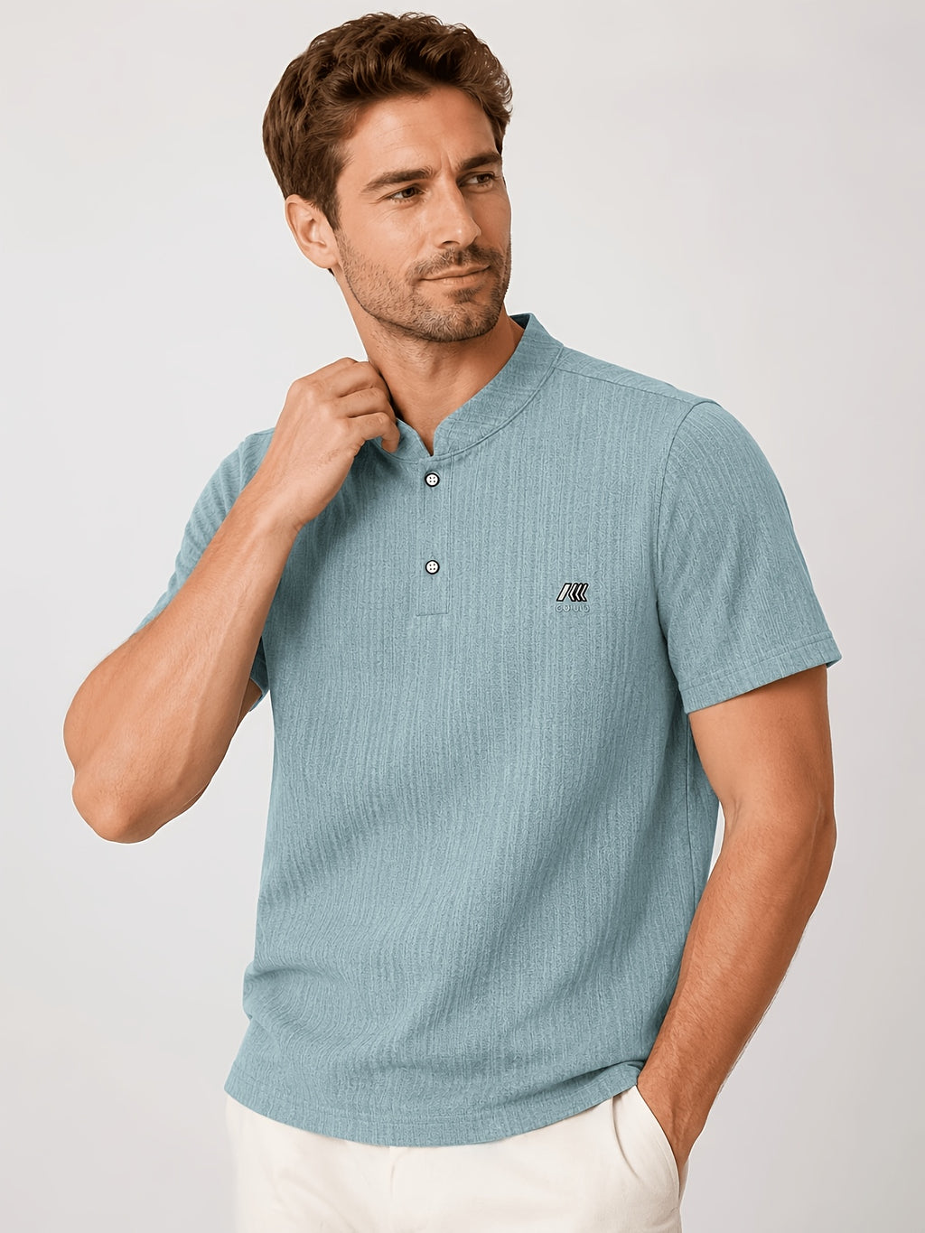 Men's Summer Textured Henley Short-Sleeve T-Shirt with Small Stand-Up Collar. Features a Simple and Elegant Two-button Placket, Vertical Ribbed Fabric on the Body for Breathability, Keeping You Cool and Sweat-free. Accented with a BUAND Brand Print - Sky Blue
