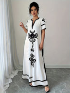 Middle Eastern Ramadan Themed Elegant Spring And Summer Party Dress with a V-Neck Short Sleeves And Paisley Print - Light White+Black Color