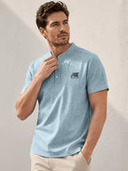 Men's Summer Textured Henley Short-Sleeve T-Shirt with Small Stand-Up Collar. Features a Simple and Elegant Two-button Placket, Vertical Ribbed Fabric on the Body for Breathability, Keeping You Cool and Sweat-free. Accented with a BUAND Brand Print - Sky Blue