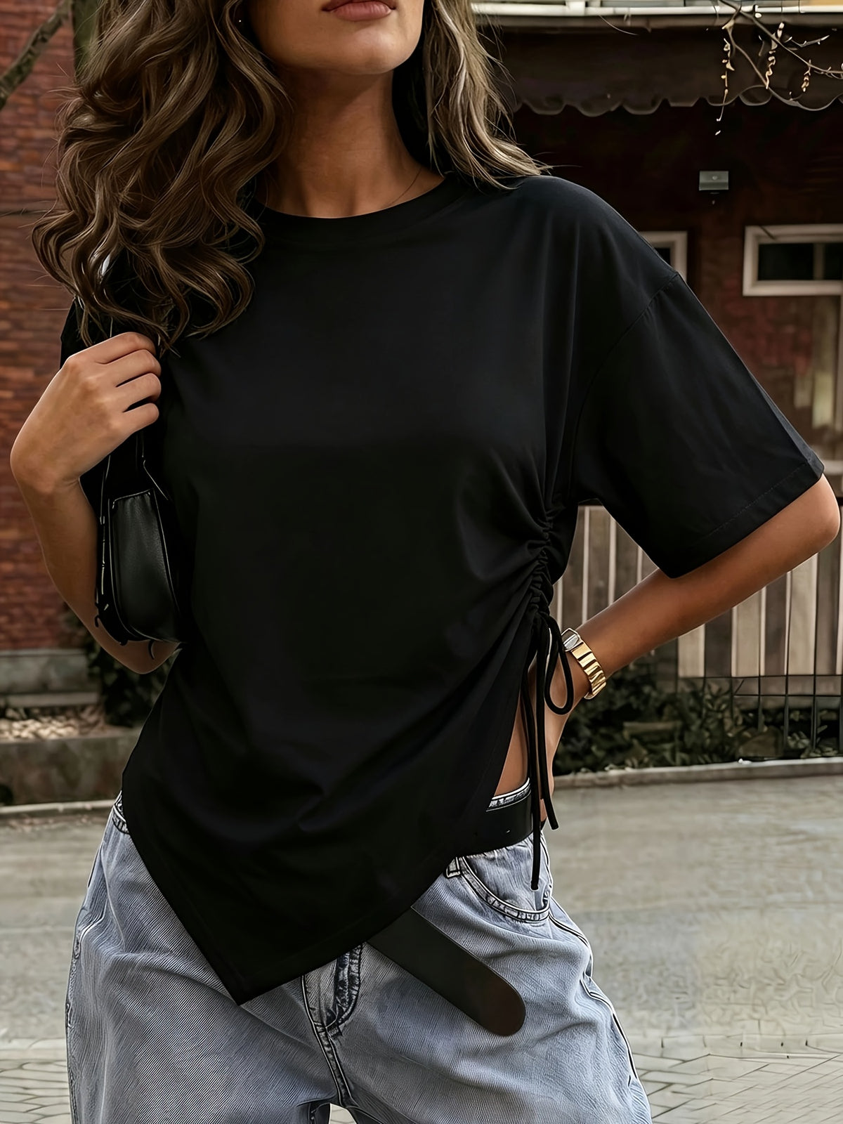 This Women's T-shirt Features a Loose Asymmetrical Design with Rope-style Embellishments, Making It Perfect for Daily Work or Date Wear. It's a Versatile Choice for Spring and Summer Seasons - Black