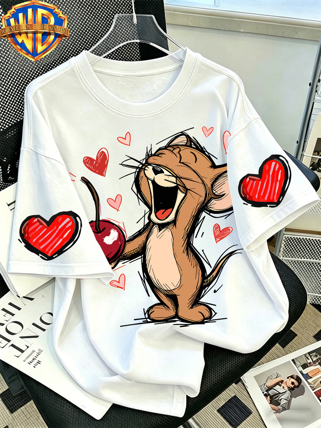 Official Warner Bros. T-shirt Featuring a Print of a Classic Character Laughing While Holding a Cherry; Men's 100%, Comfortable, Versatile, and Loose-fitting Short-sleeve Summer Tee-suitable for Outdoor Activities and Casual Attire. - White