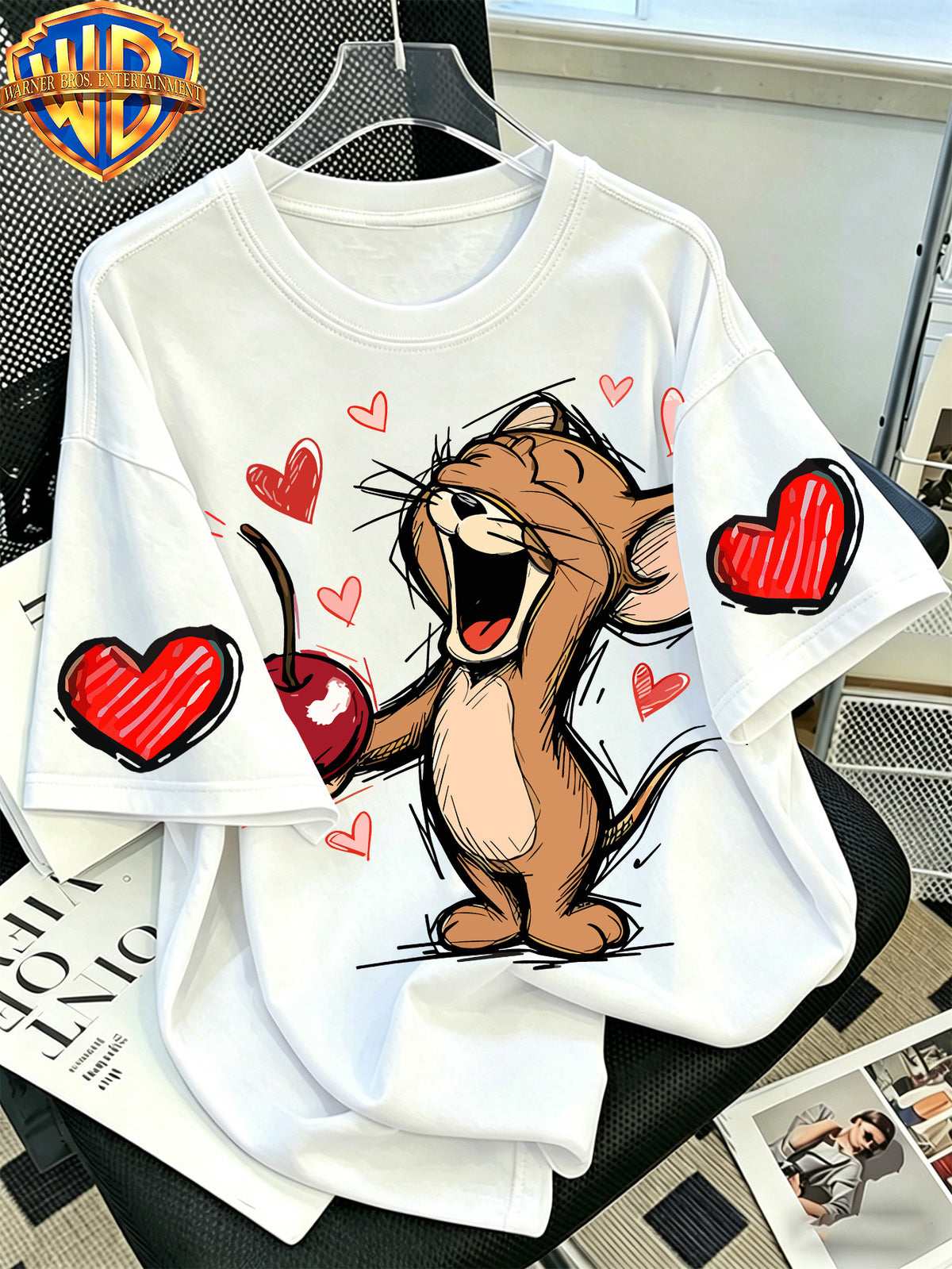 Official Warner Bros. T-shirt Featuring a Print of a Classic Character Laughing While Holding a Cherry; Men's 100%, Comfortable, Versatile, and Loose-fitting Short-sleeve Summer Tee-suitable for Outdoor Activities and Casual Attire. - White