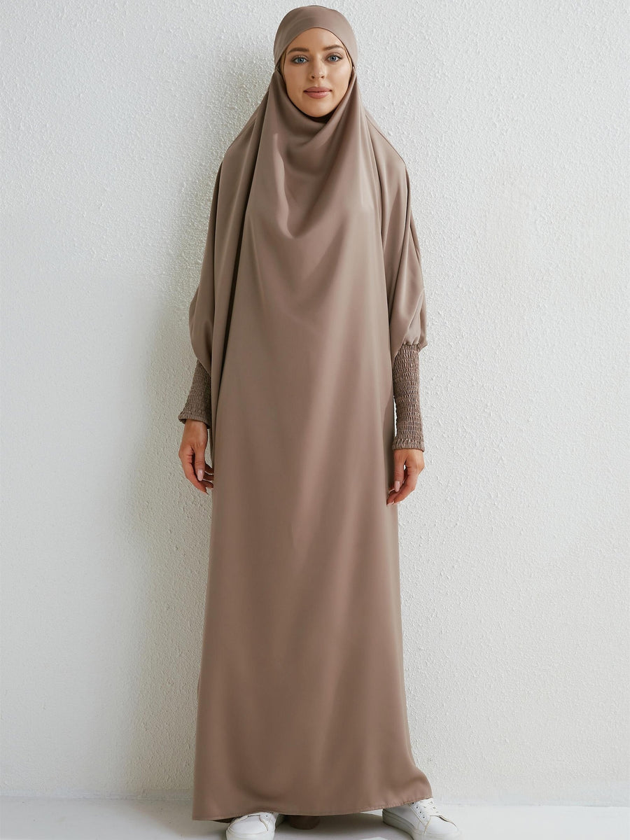 Islamic Attire for Women Featuring a Hooded Jilbab with Smocking Sleeves, Designed for Prayer, Suitable for Modesty in Dubai And Saudi Arabia, Available in Black - Taro