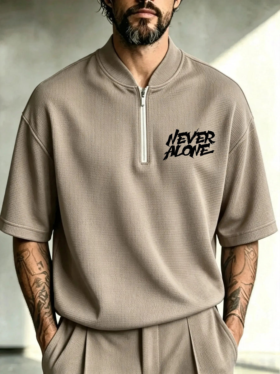 Men's Waffle Knit Half-Zip Polo Shirt with Punk Graffiti "NEVER ALONE" Print - Stand Collar Short Sleeve T-Shirt Suitable for Spring/Autumn, Loose Fit Streetwear, Machine Washable Urban Fashion Top - (Brown)