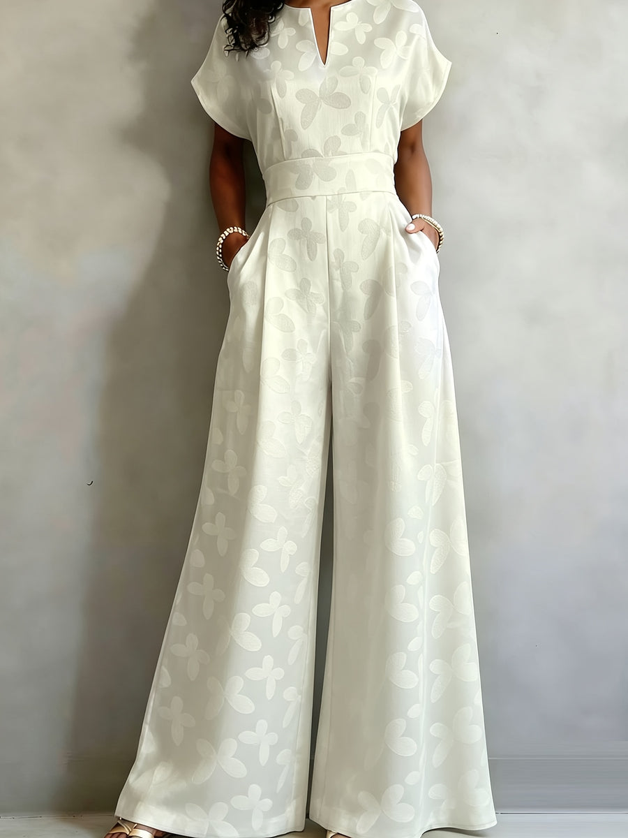 New Spring/Summer 2026 Women's Jacquard Short-Sleeve Jumpsuit with Subtle Butterfly Pattern, V-Neck, Cinched Waist, and Wide-Leg Pants. This Light Luxury, High-end Jumpsuit Offers a Sophisticated Look for Commuting. The Simple and Exquisite V-neck - Off-white
