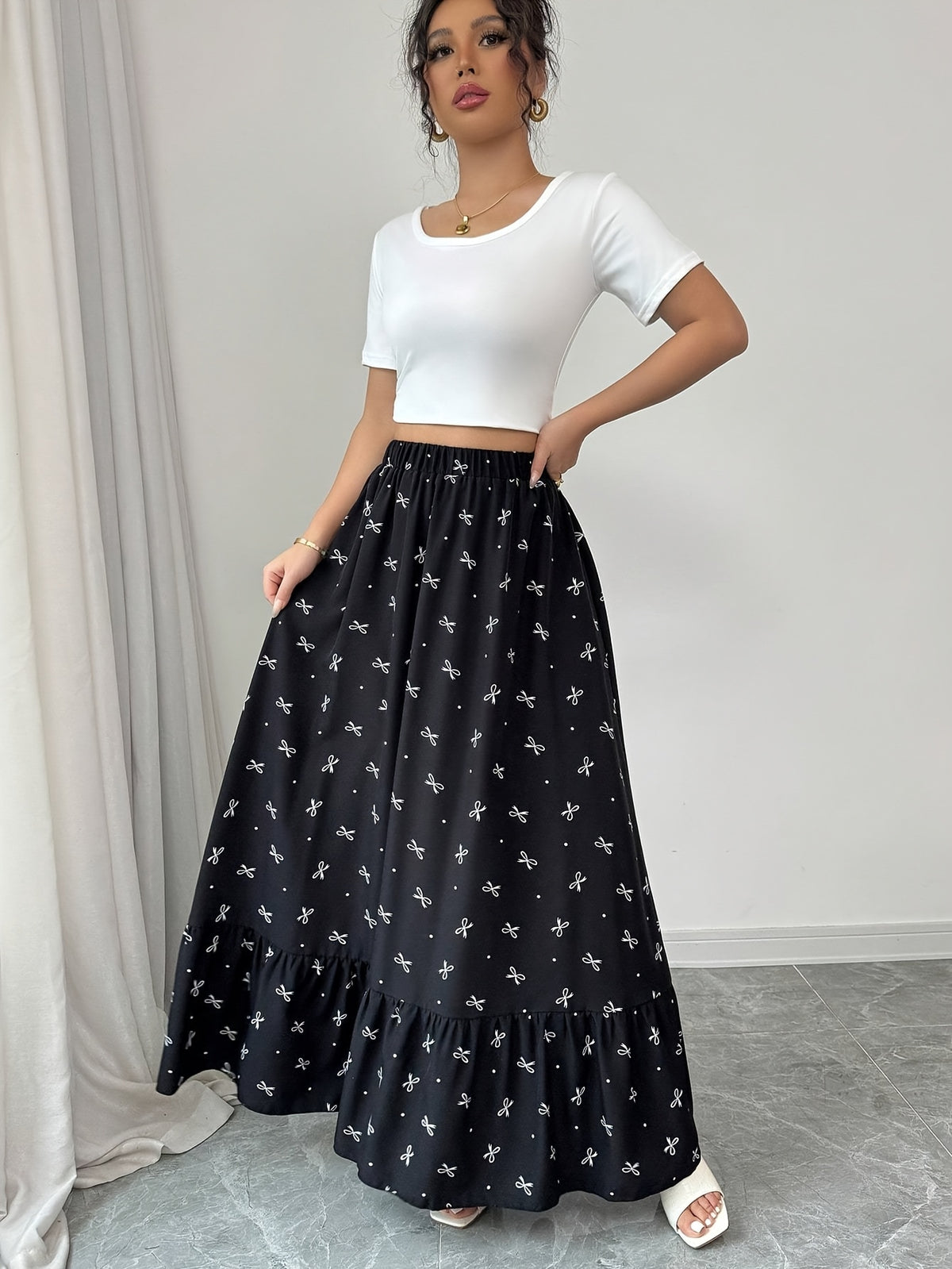 Elegant Directional Women'S Bow Print Half Skirt - Black