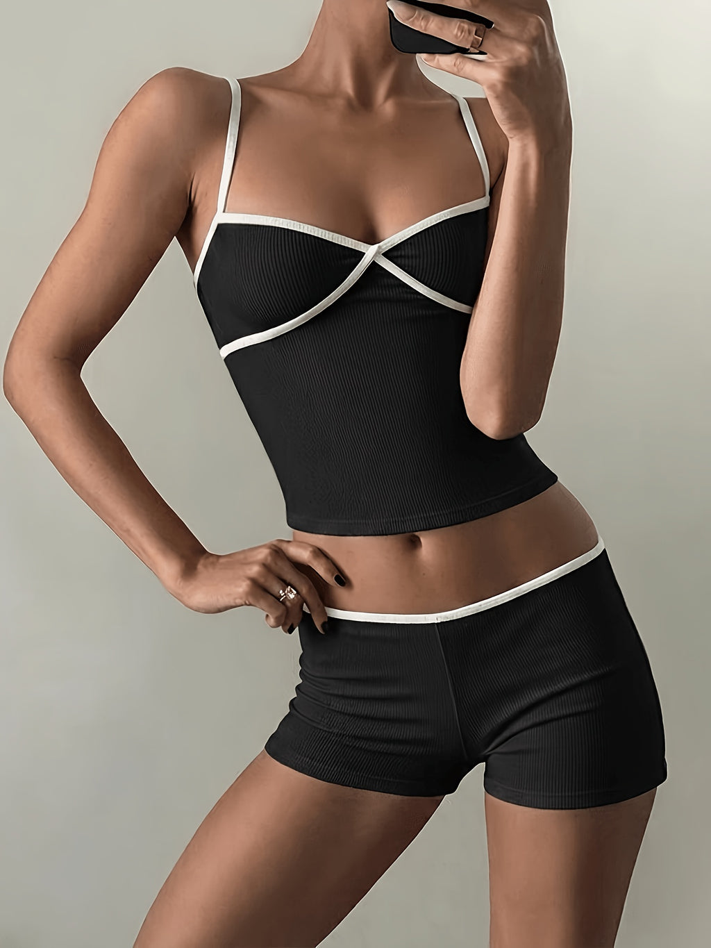 This Comfortable and Versatile Tank Top and Shorts Set Is Perfect for Wearing at Home. - Black