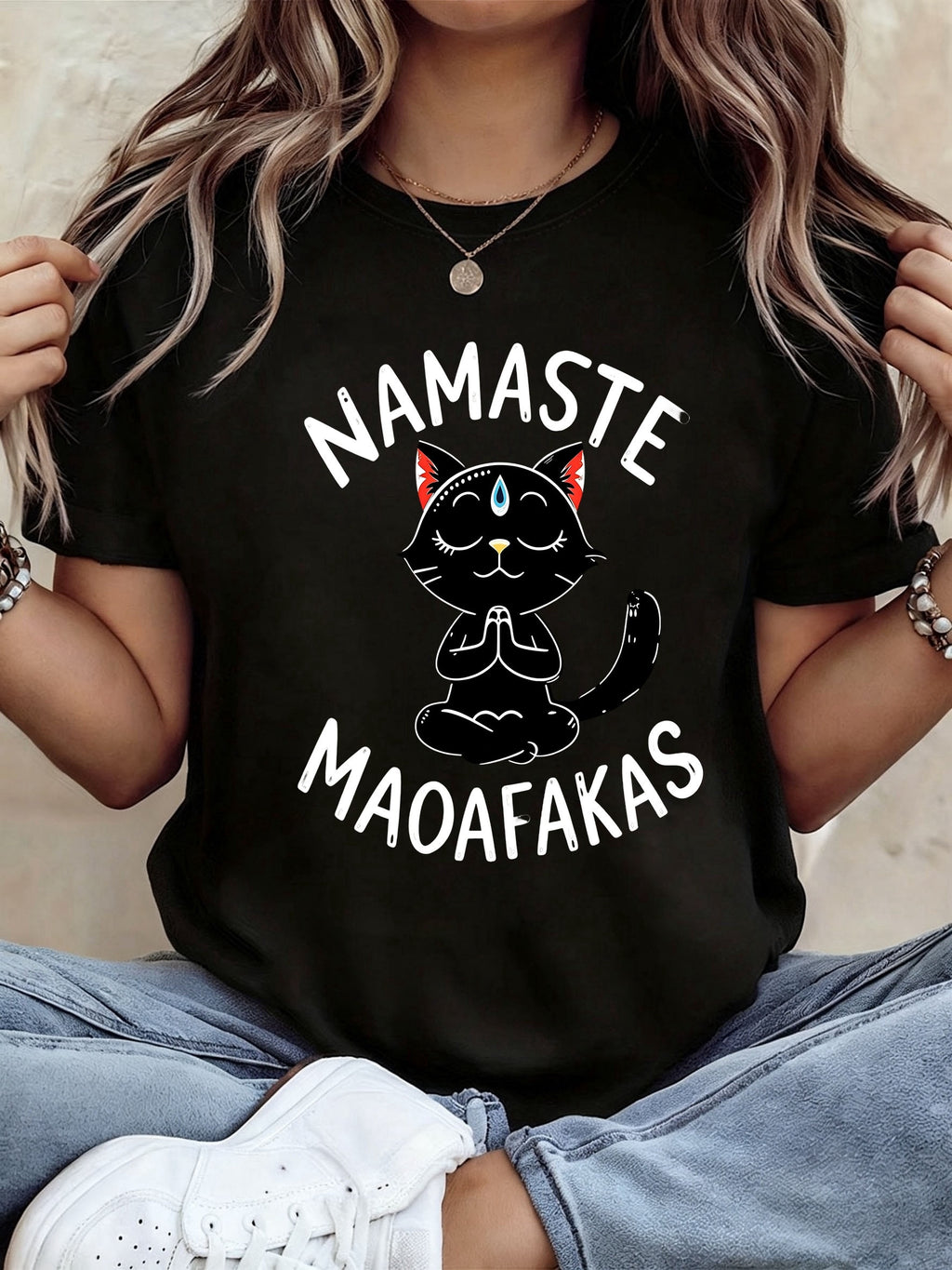 Women' Fashion Black T-shirt, Made of Polyester Fabric, Featuring a Meditating Cat Motif. Perfect for Women' Wear, Showcasing a Stylish and Casual Look. Ideal for Everyday Outfits. Modern Design, Comfortable to Wear. - Black