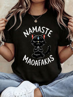 Women' Fashion Black T-shirt, Made of Polyester Fabric, Featuring a Meditating Cat Motif. Perfect for Women' Wear, Showcasing a Stylish and Casual Look. Ideal for Everyday Outfits. Modern Design, Comfortable to Wear. - Black
