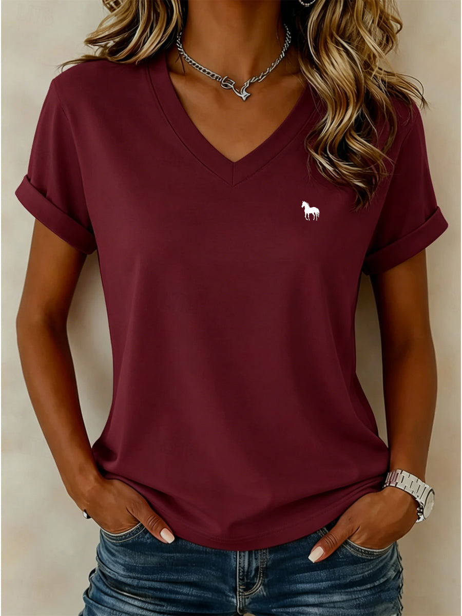 Stylish and Casual V-neck Short-sleeve T-shirt, Featuring a Galloping Horse Silhouette Print on the Left Chest, with Clean Lines Outlining the Horse's Form, Adding a Free-spirited Western Fashion Touch to the Basic Design - Burgundy