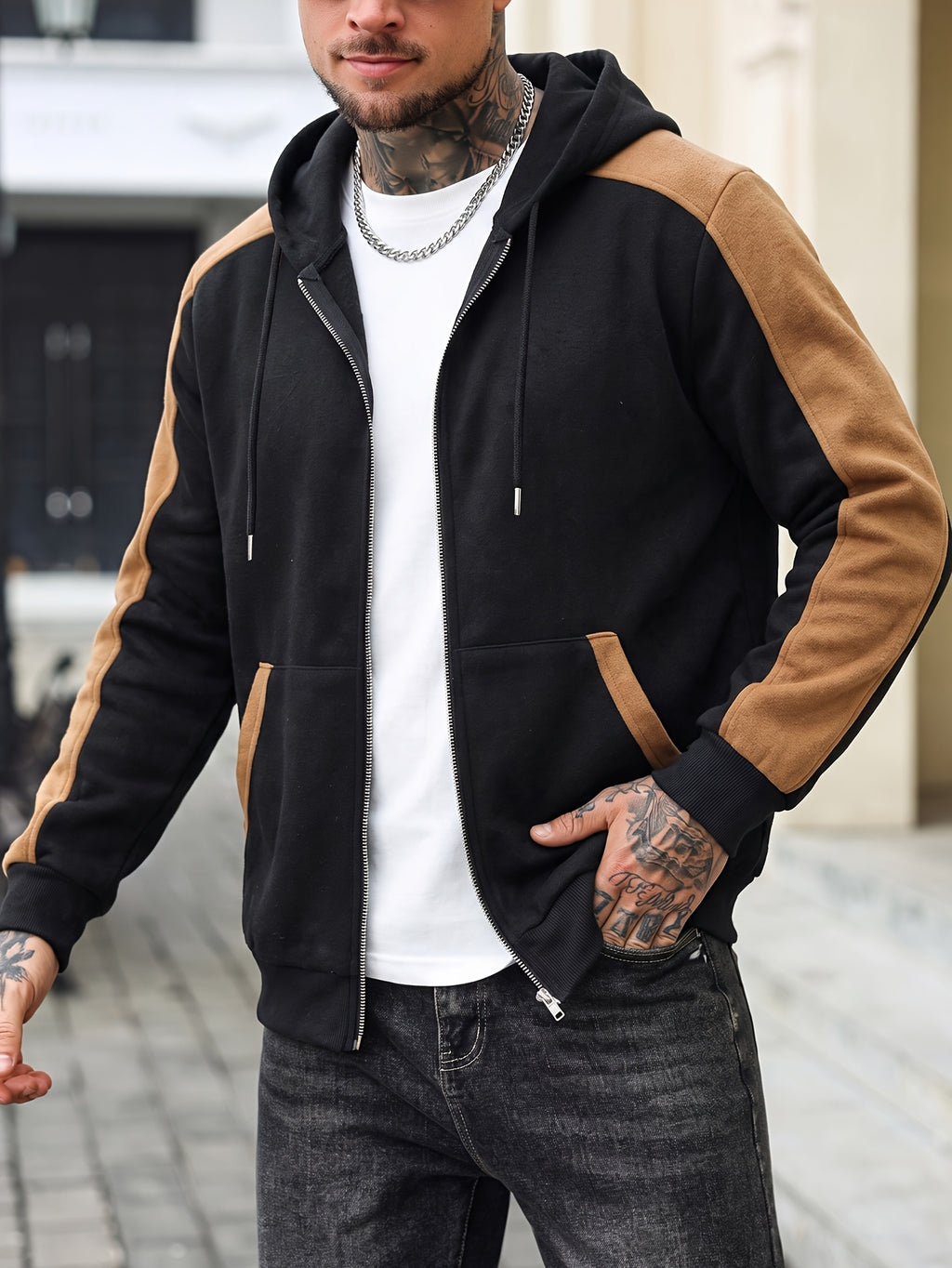 Men's Trendy Color-Block Hooded Jacket New Arrival! The Black-and-brown Spliced Design Offers a Strong Visual Sense of Layering, with Smooth Fabric for a Comfortable and Stylish Fit. The Full-length Zipper and Pockets Are Both Practical - Black