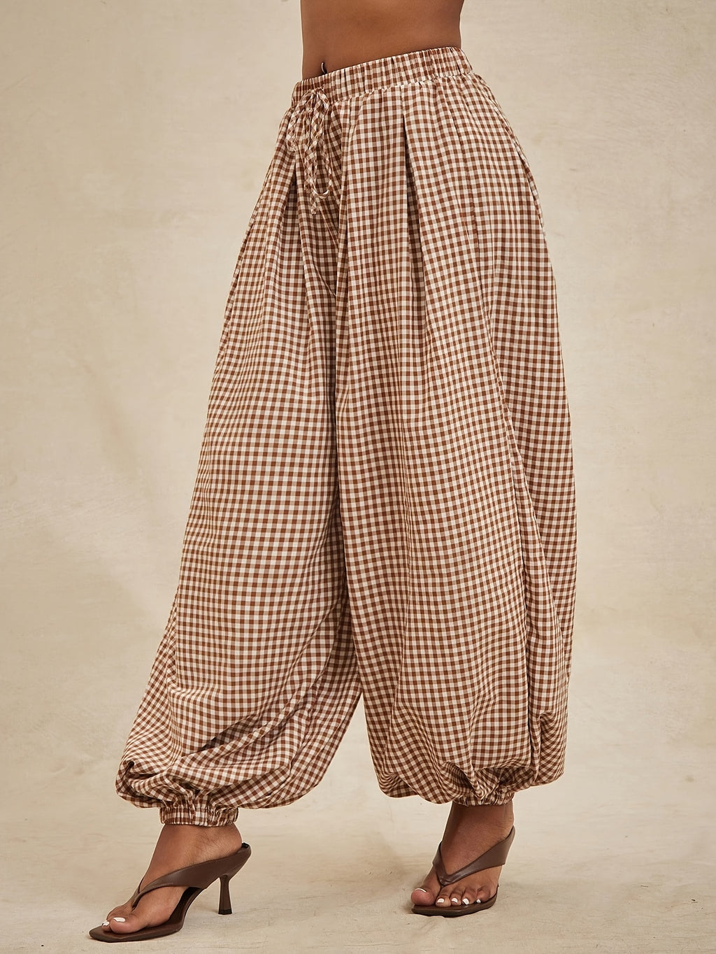 High-waisted Elastic Drawstring Plaid Loose-fit Cuffed Lantern Casual Pants, Made of Lightweight, Smooth, and Breathable Fabric. Wide-leg Design Helps Conceal and Slim the Figure, Offering a Relaxed Vintage Look. Perfect for Daily Wear - Khaki