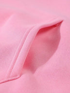 Dark and Edgy Style Hooded Sweatshirt, Featuring a Reimagined Clown Portrait Print with a Graffiti-like Texture That Exudes a Street Vibe. Packed with Streetwear Brand Attributes, It Unleashes a Free-spirited Aura and Is Unisex for Both Men and Women - Pink Color