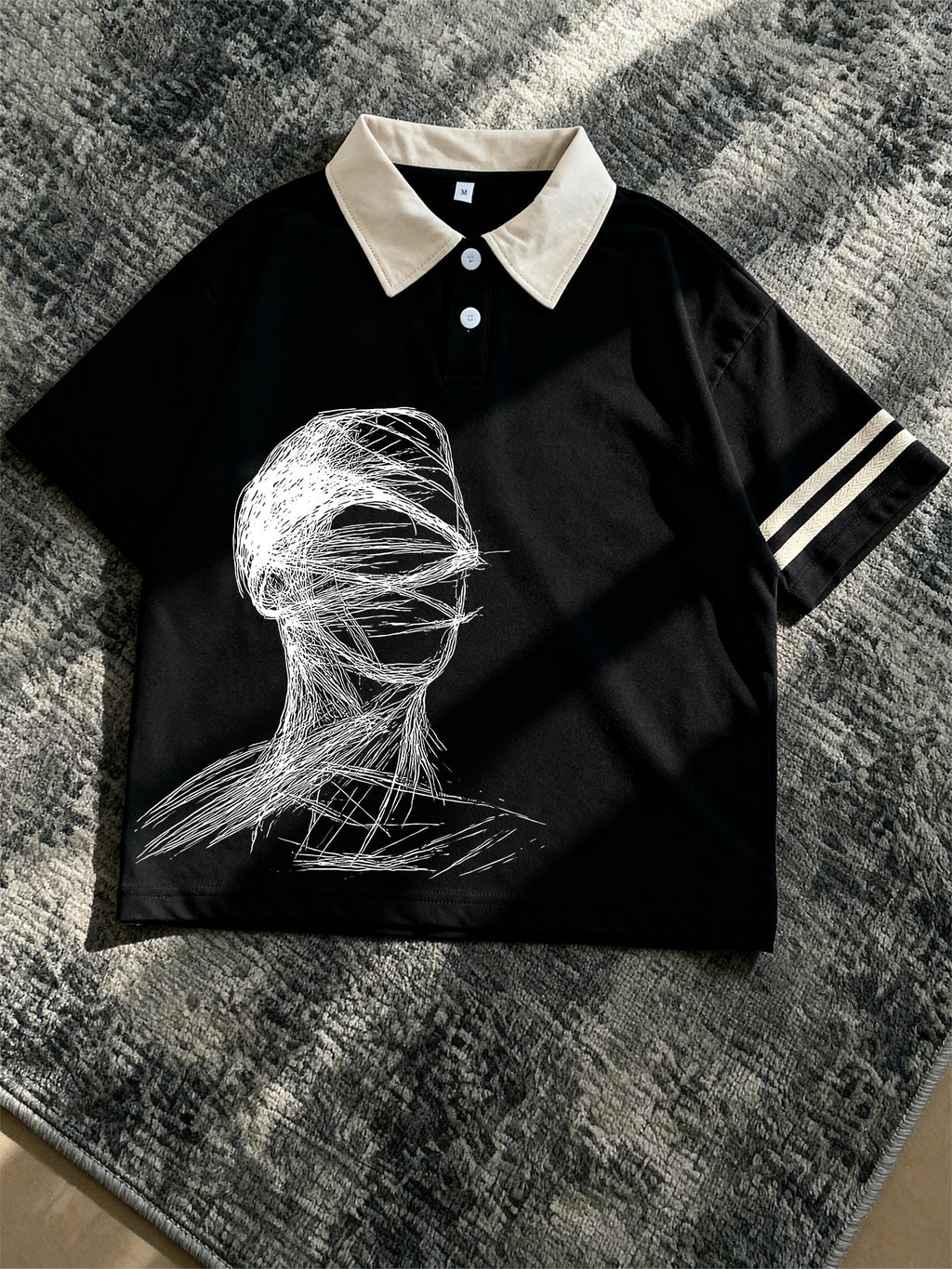 Men's New Polo Shirt, Black Base with Beige Contrast Collar, Double White Stripes on Cuffs, Abstract Line Portrait Print on Chest, Loose Fit, Artistic and Atmospheric, Suitable for Daily Casual and Commute. - Black