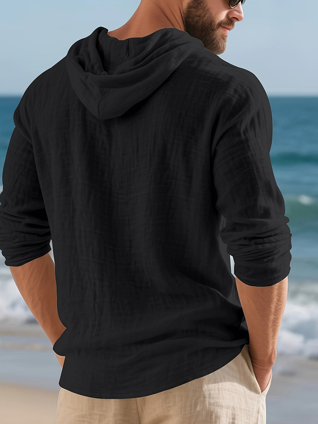 Men's Casual Linen Hoodie, Long Sleeve Henley Button Pullover. Crafted from Soft, Lightweight and Breathable Fabric, It Features a Relaxed Fit and Front Kangaroo Pocket. Ideal for Beach Vacations, Outdoor Activities, Travel and Daily Casual Wear. - Black