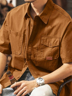 Men's Casual Short Sleeve Shirt, Blend Workwear Button Shirt with Multi Pockets, Solid Color Loose Fit, Breathable Summer Tops for Outdoor Daily WearMen's Multi-Pocket Short Sleeve Work Shirt, Casual Loose Fit Blend Button Shirt for Daily & Outdoor - Chocolate