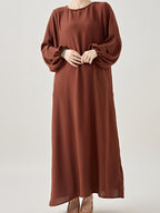 Comfortable & Casual Solid Color Muslim Dress with Bubble Pleats, Elastic Cuffs, and Flowy Hem - Polyester, Machine Washable - Dark Brown