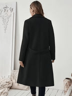 New Autumn/Winter Classic Notched Lapel Long Coat for Women, Waist-Cinching with Tie Belt and Two-Button Design, Over-the-Knee Outerwear, Elegant Commuter Style, Draped and Structured Long-Sleeve Coat with Side Pockets, Simple and Versatile, Slim Fit - Black