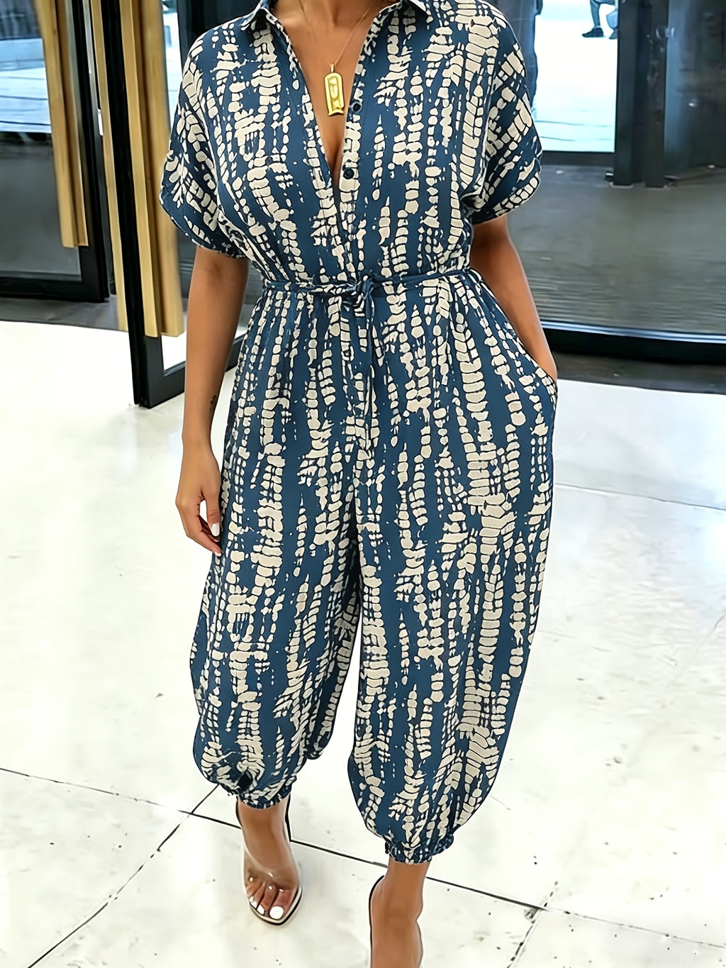 Summer Lapel Short-sleeve Printed Jumpsuit with Front Button Design, Comfortable to Wear, Elegant and Casual Overall for Women, Batwing Sleeve Design, Wide-leg Design with Front Tie, Suitable for Dates, Work, Vacations, Festivals, and Casual Wear - Blue