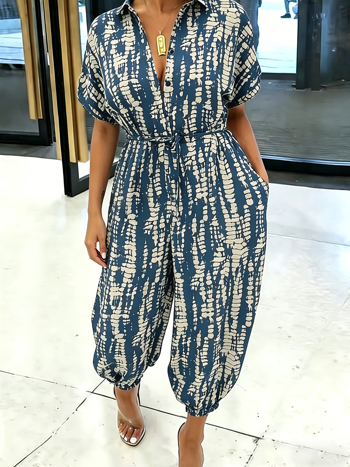 Summer Lapel Short-sleeve Printed Jumpsuit with Front Button Design, Comfortable to Wear, Elegant and Casual Overall for Women, Batwing Sleeve Design, Wide-leg Design with Front Tie, Suitable for Dates, Work, Vacations, Festivals, and Casual Wear - Blue