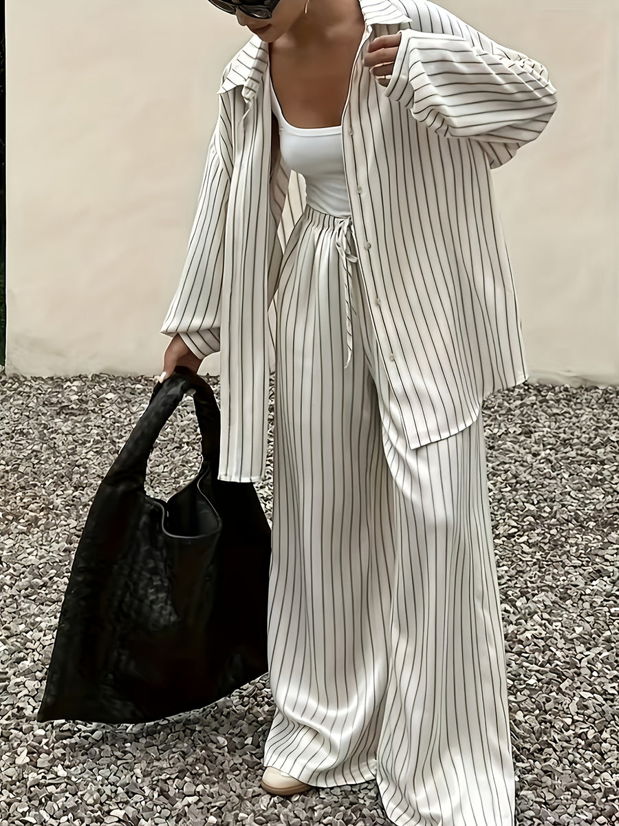Striped Loose-fit Set with a Draped Feel, Creating a Casual and Laid-back Vibe. The Relaxed Silhouette and Striped Pattern Offer a Sophisticated Texture, Perfect for a Relaxed yet Refined Mature-casual Style. Suitable for Light Social Occasions Such - White