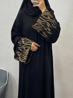 Elegant and Dignified Long Abaya, Black Robe with Solid-color Floral and Leaf-shaped Embroidery on the Cuffs, Breathable Fabric Long Dress, Suitable for Daily Casual Gatherings and Ramadan Prayers - Golden